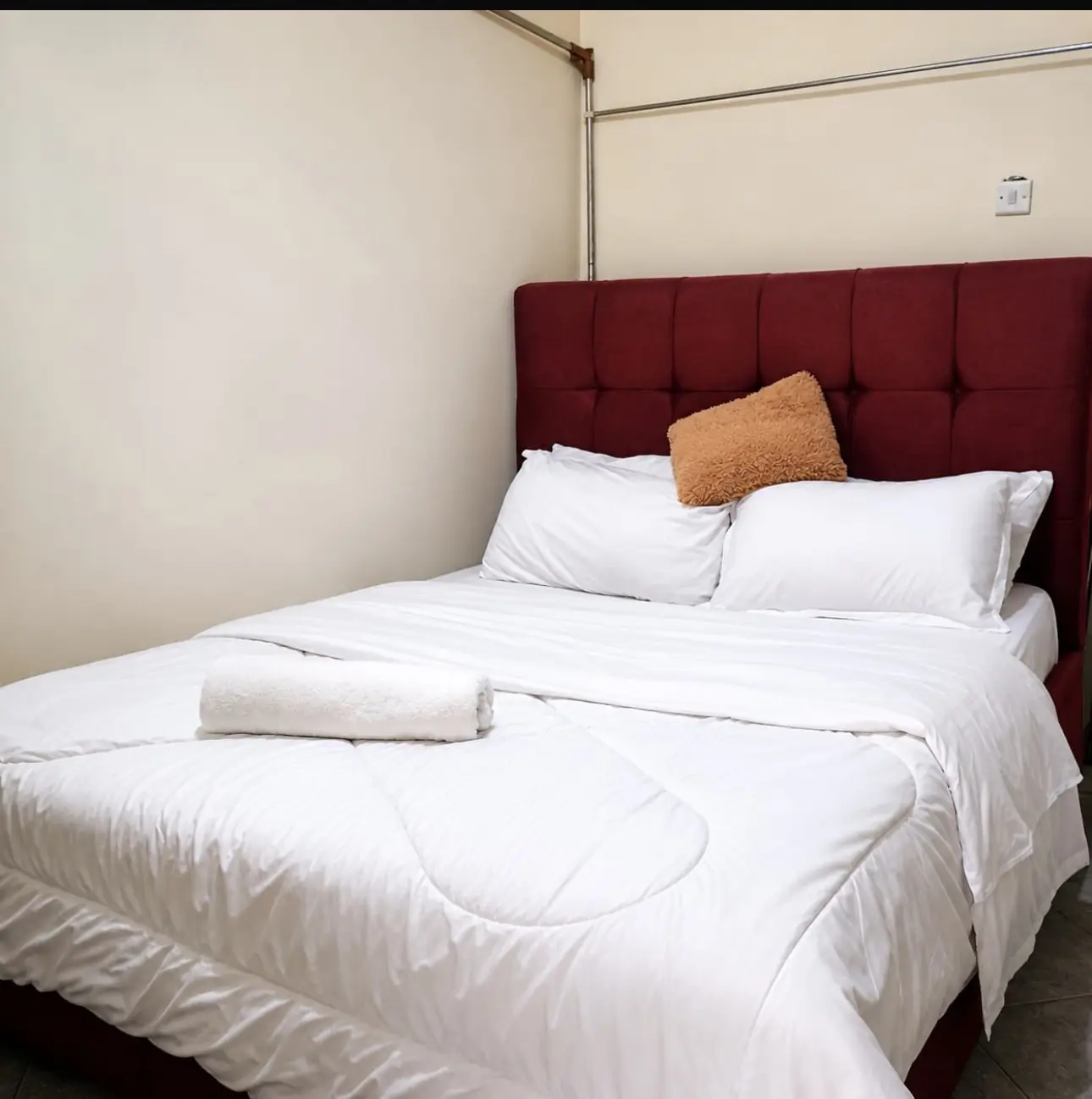 Open balcony walkway at NOAZ Hotel Kampala in Kungu